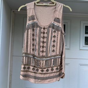 Gorgeous beaded tank. Casual or dressy. Perfect condition. XS but loose fitting